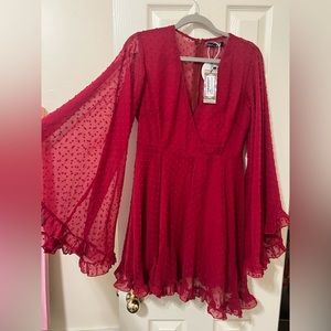 BOHOO Red long sleeve dress with sheer fabric and ruffles, bell sleeves. New.
